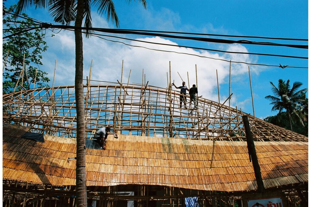 Bamboo roof installers at work.