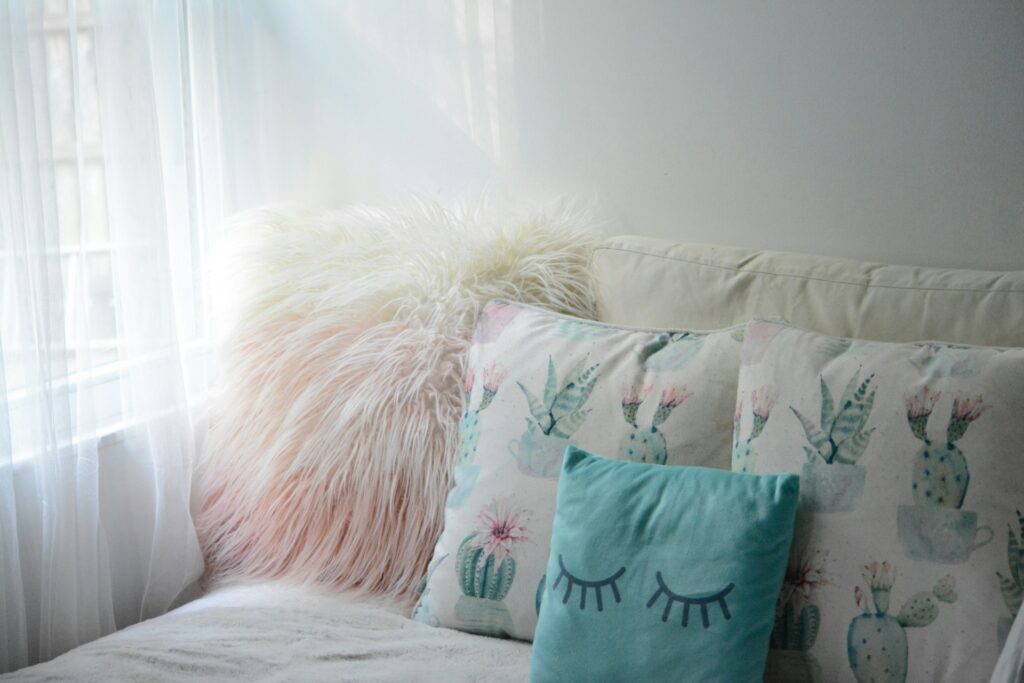 decorating for spring with throw pillows on bed
