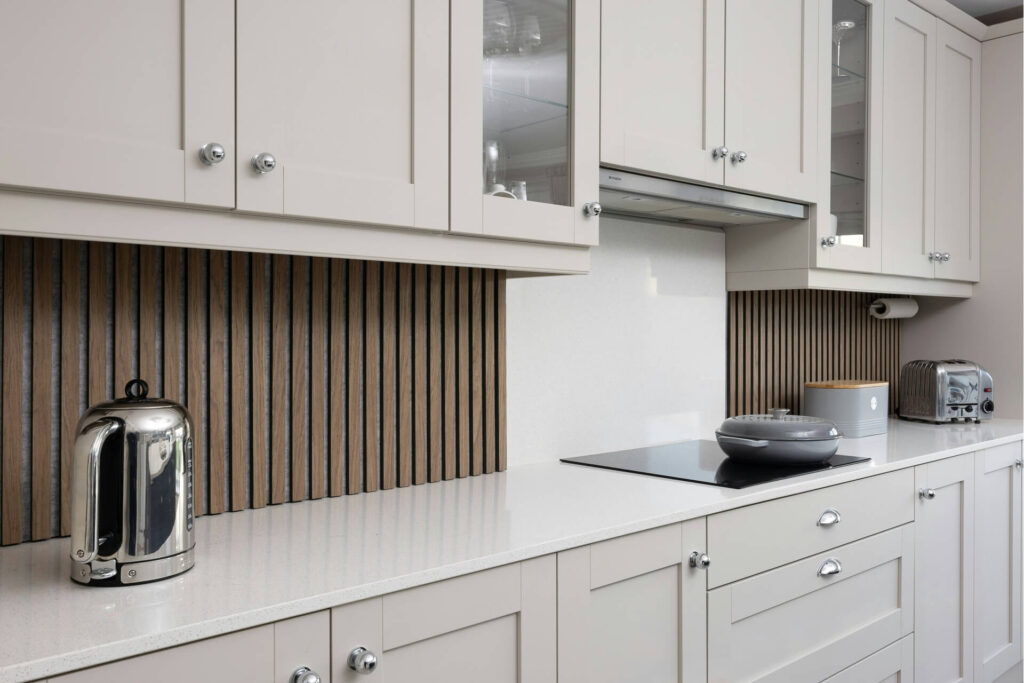 A modern kitchen counter and cabinets