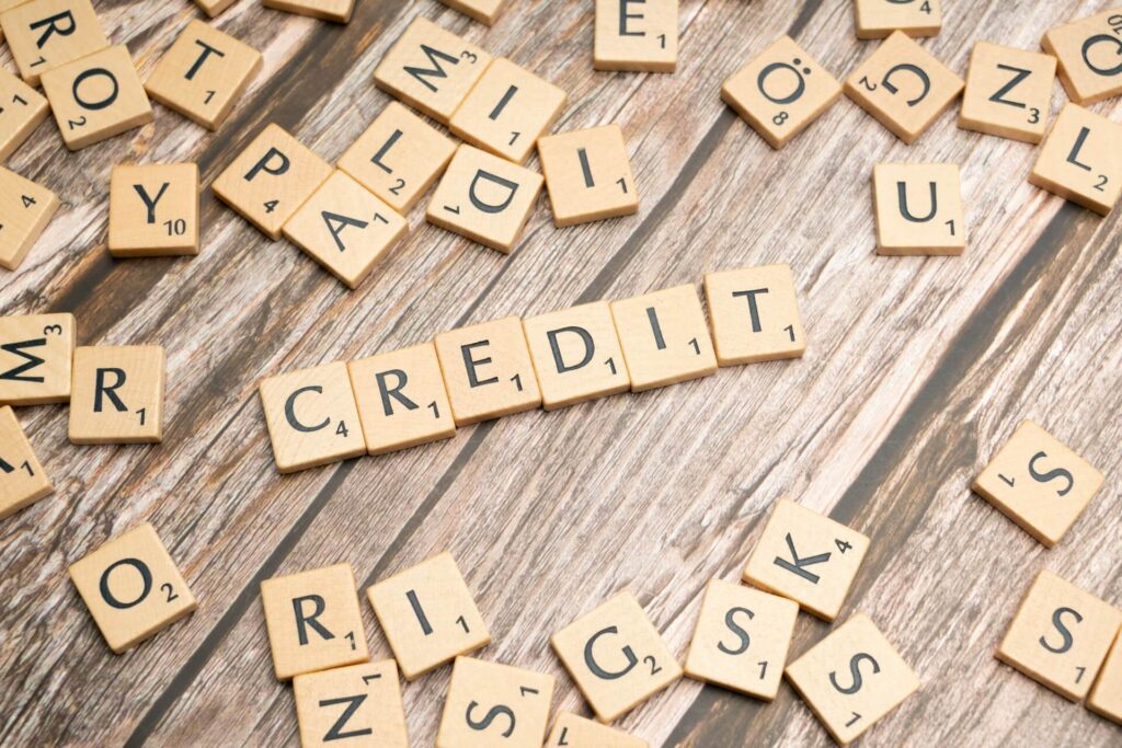 Scrabble tiles forming the word credit
