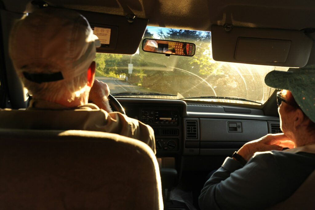 movers in a car, going to their new address