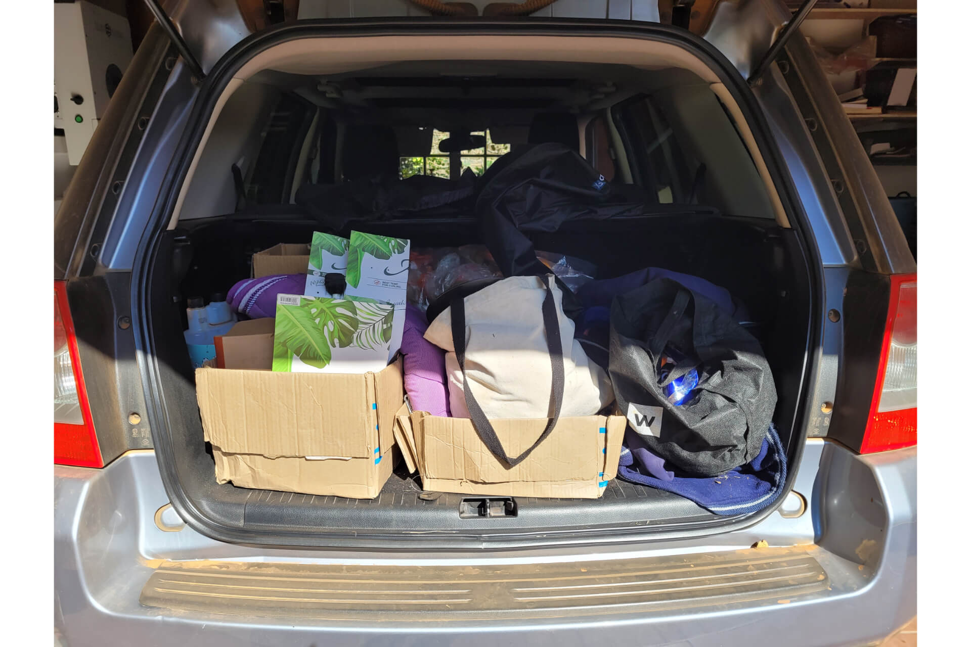 If only I used a car trunk organizer sooner.