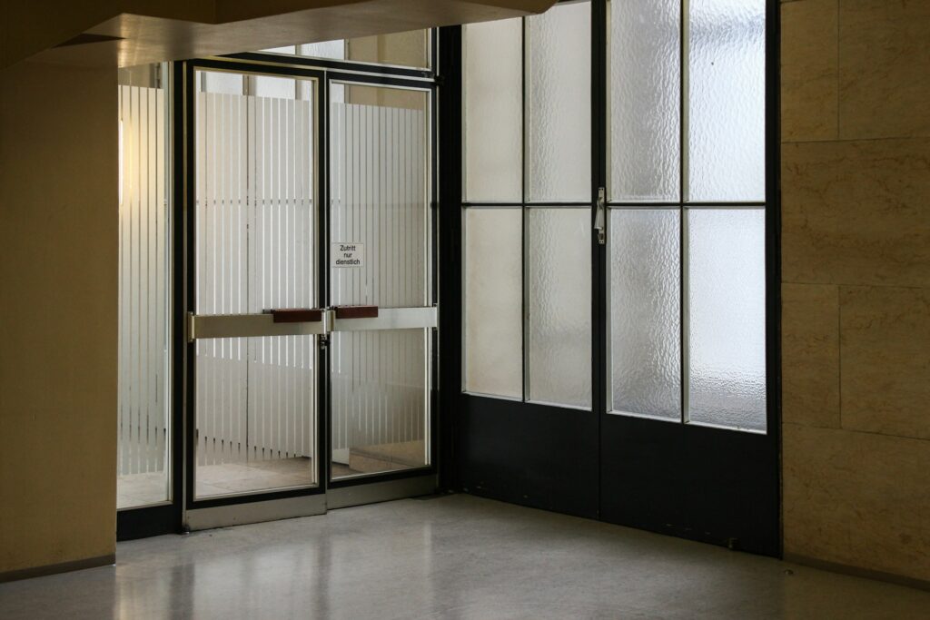 Fluted glass door in a building.