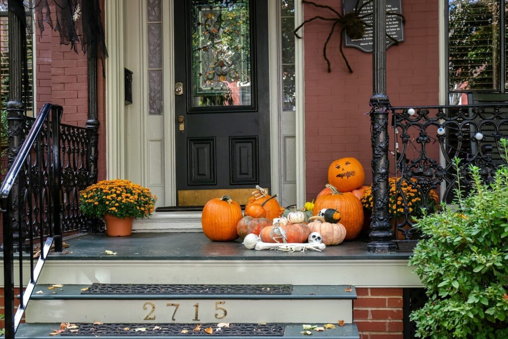 Halloween front porch with pumpkins and gourds