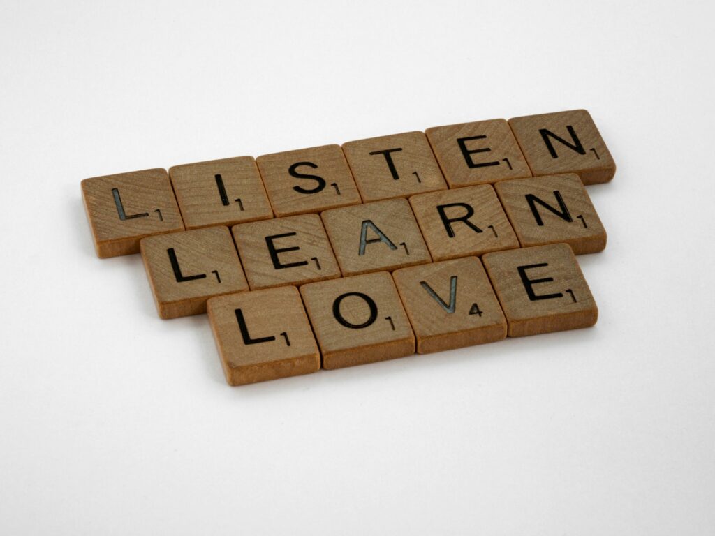 listen, learn, love sign to symbolize importance of listening