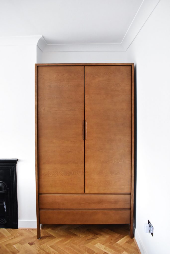 Wooden armoire with closed doors