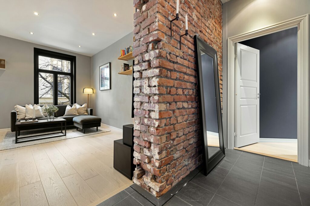 minimalistic living room with exposed brick wall