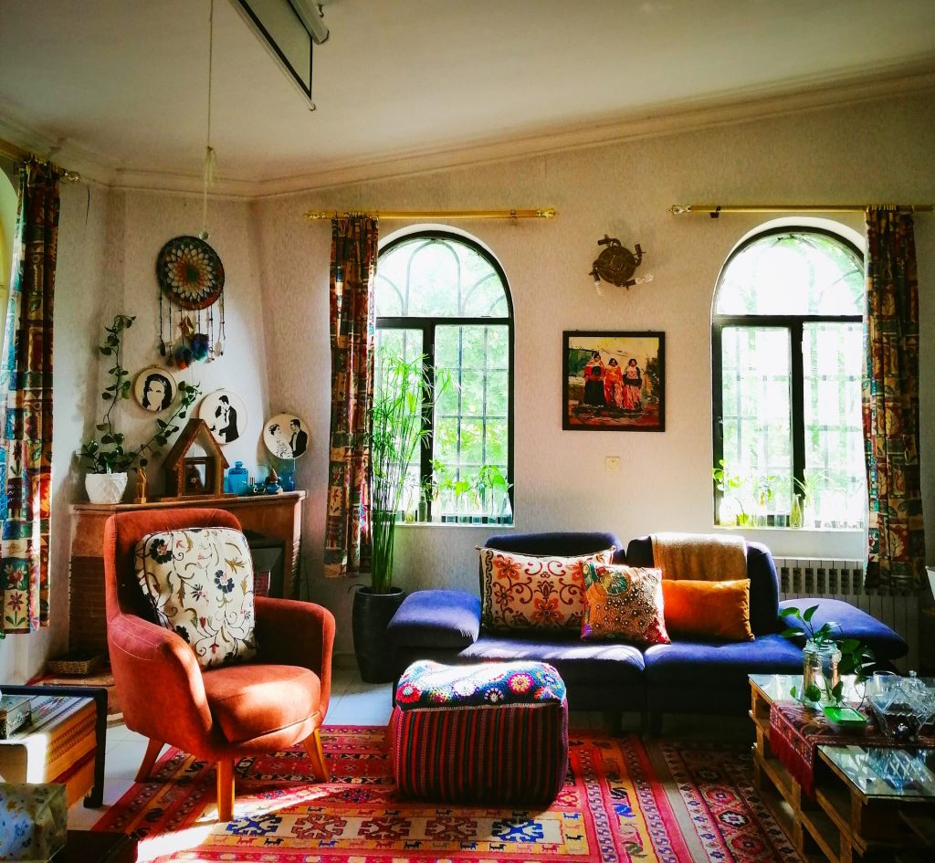 bohemian living room with houseplants and bright colors