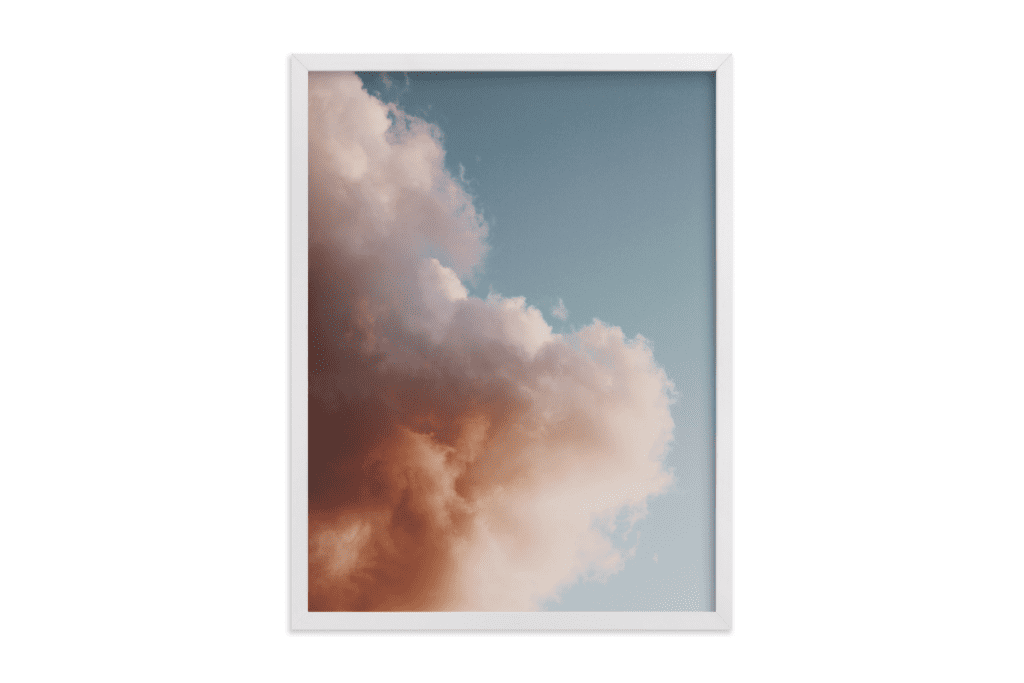 a pretty framed photo of pink clouds in a blue sky