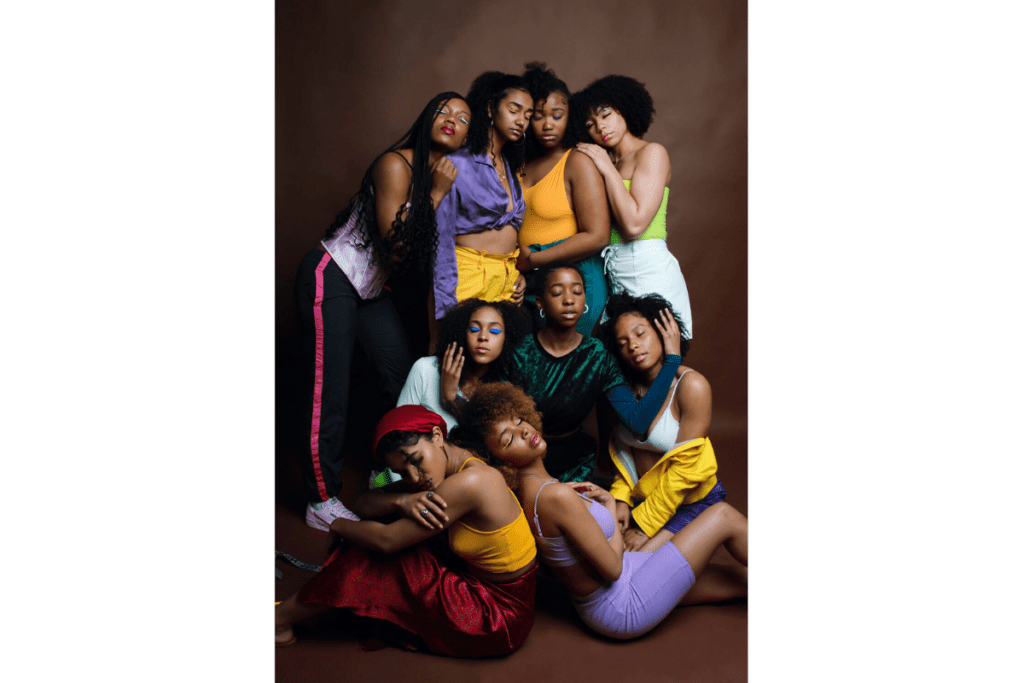 a photo of a collective of Black woman posing with each other