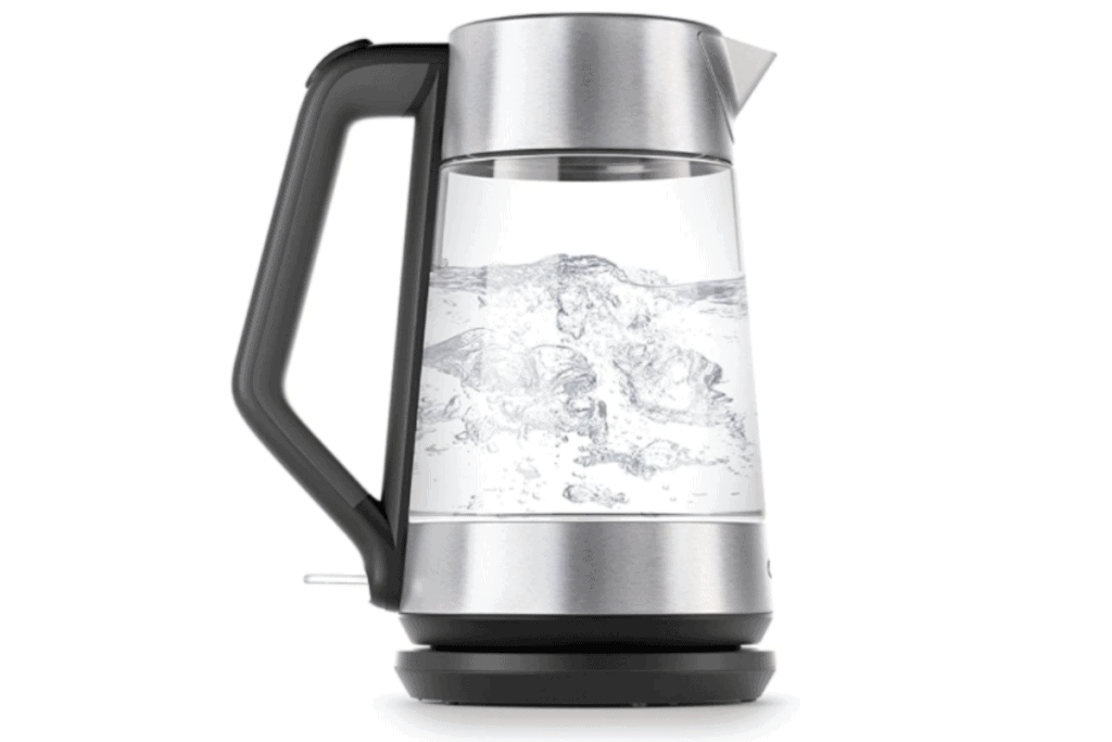 a silver and black electric kettle with boiling water