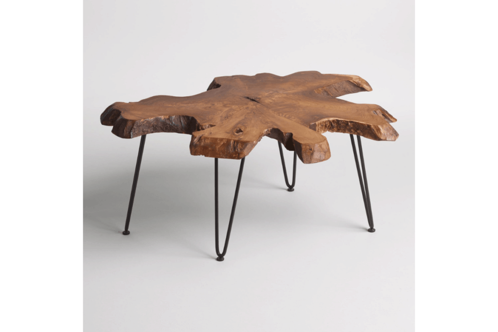 an oddly shaped wooden craft table