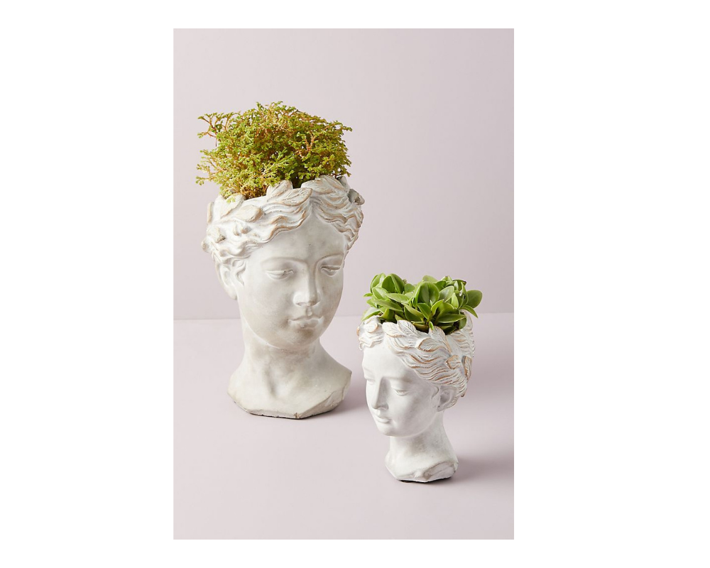two Grecian head flower pots