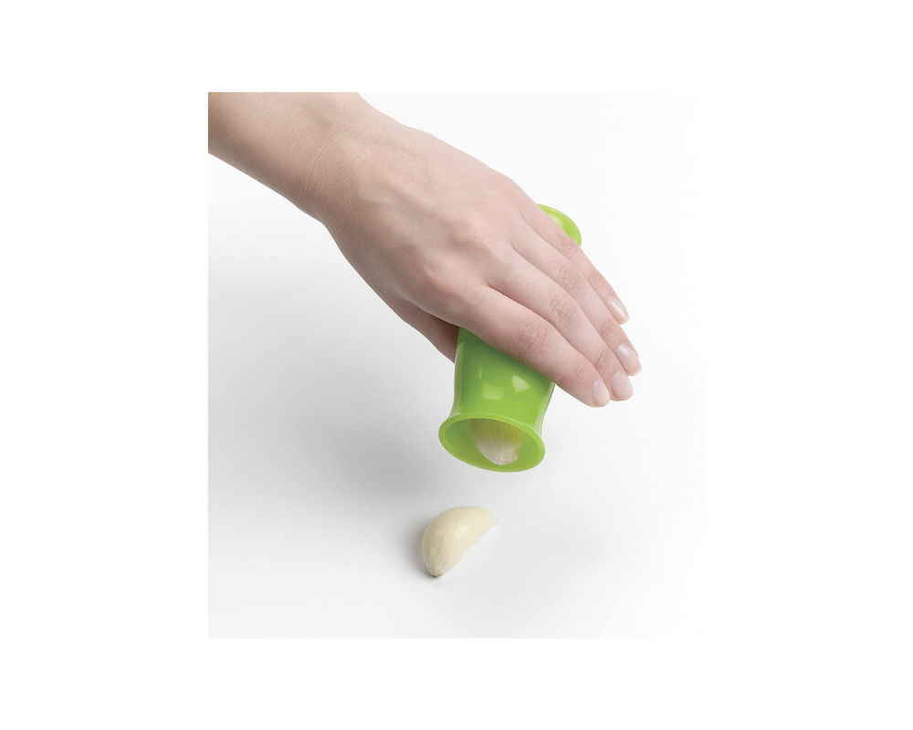 a green garlic peeler