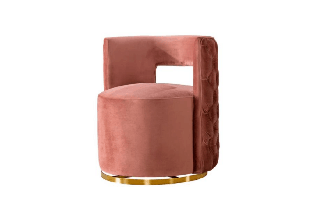 a rose colored plush velvet chair