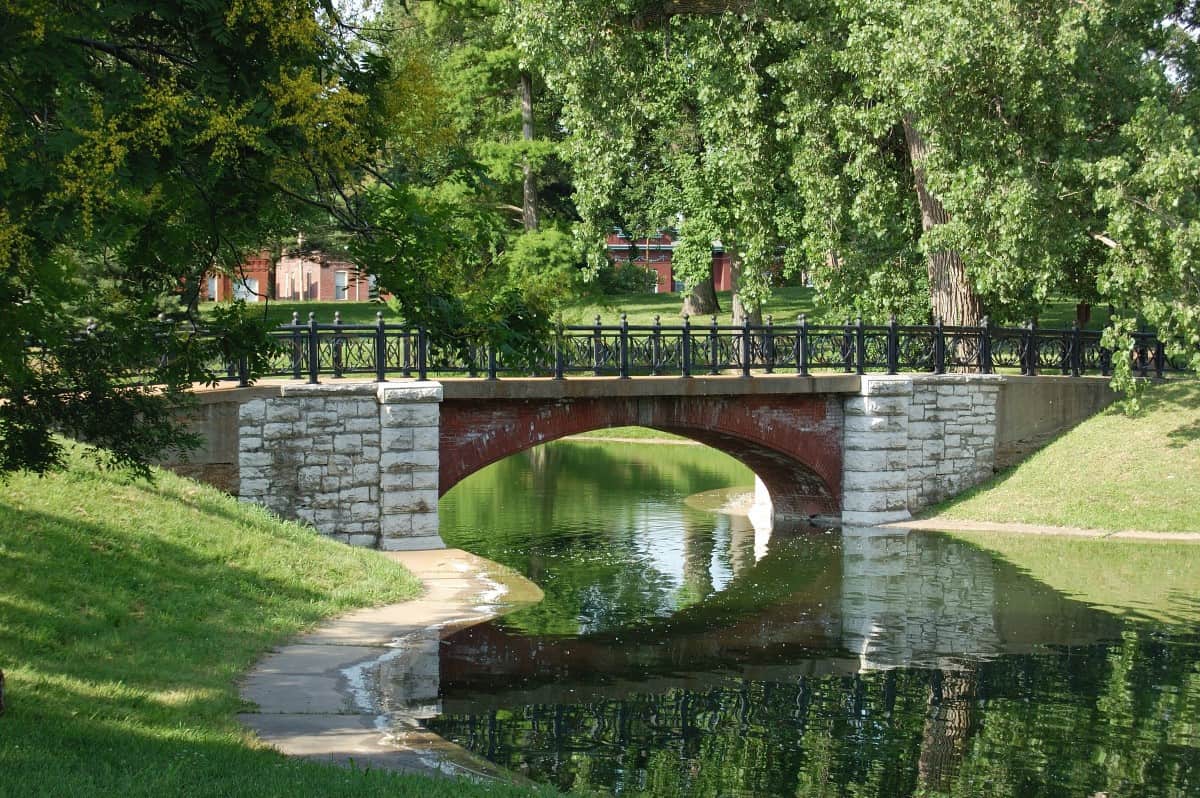 a brick bridge in a park in St. Louis, MO