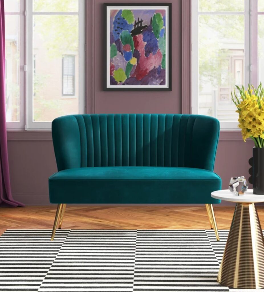 small teal vintage loveseat