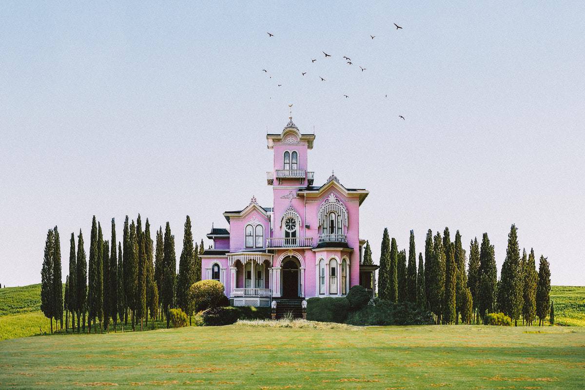 a pink Victorian home