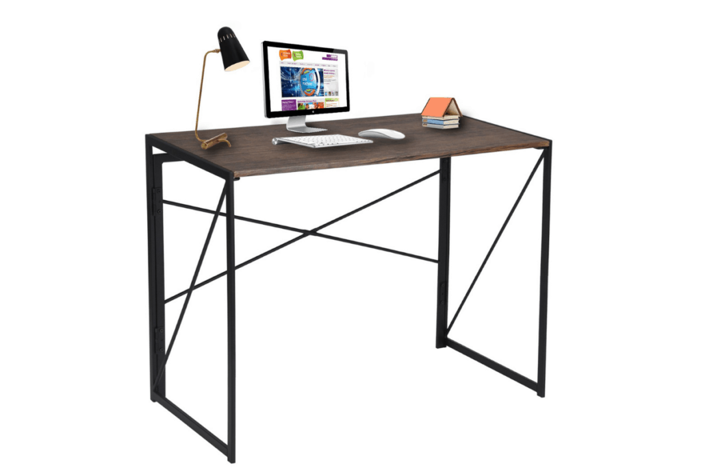 thin standing desk with a laptop on it