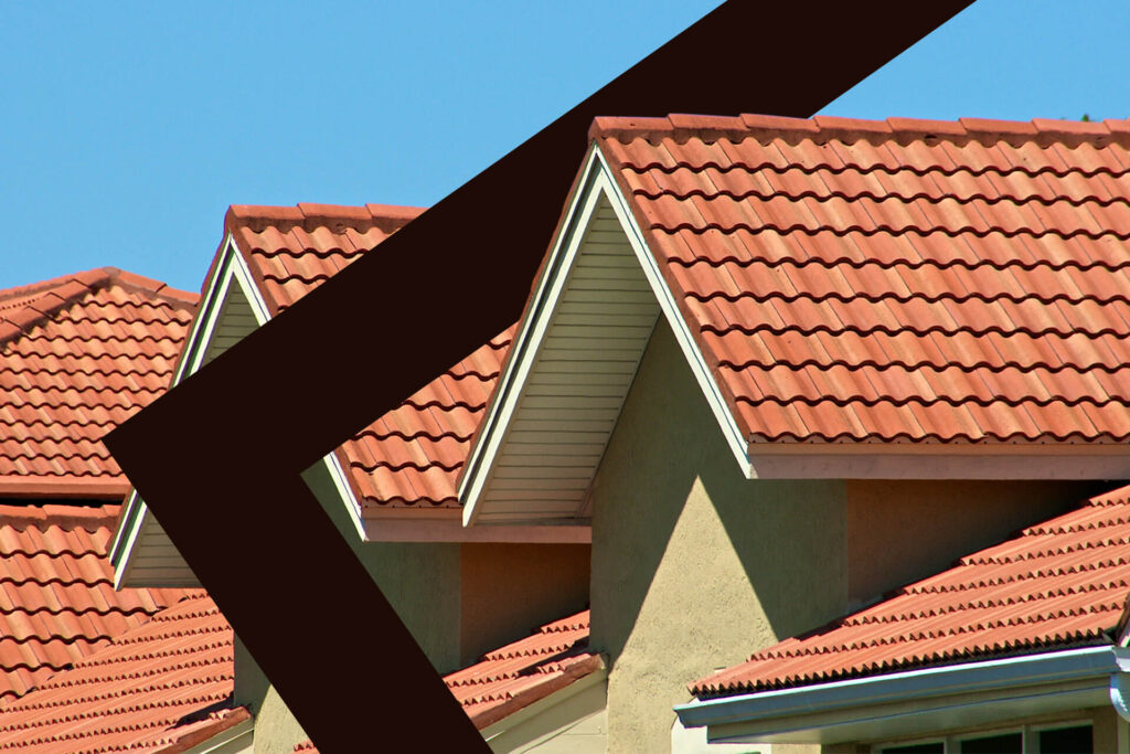 terracotta roof with blue sky in the background