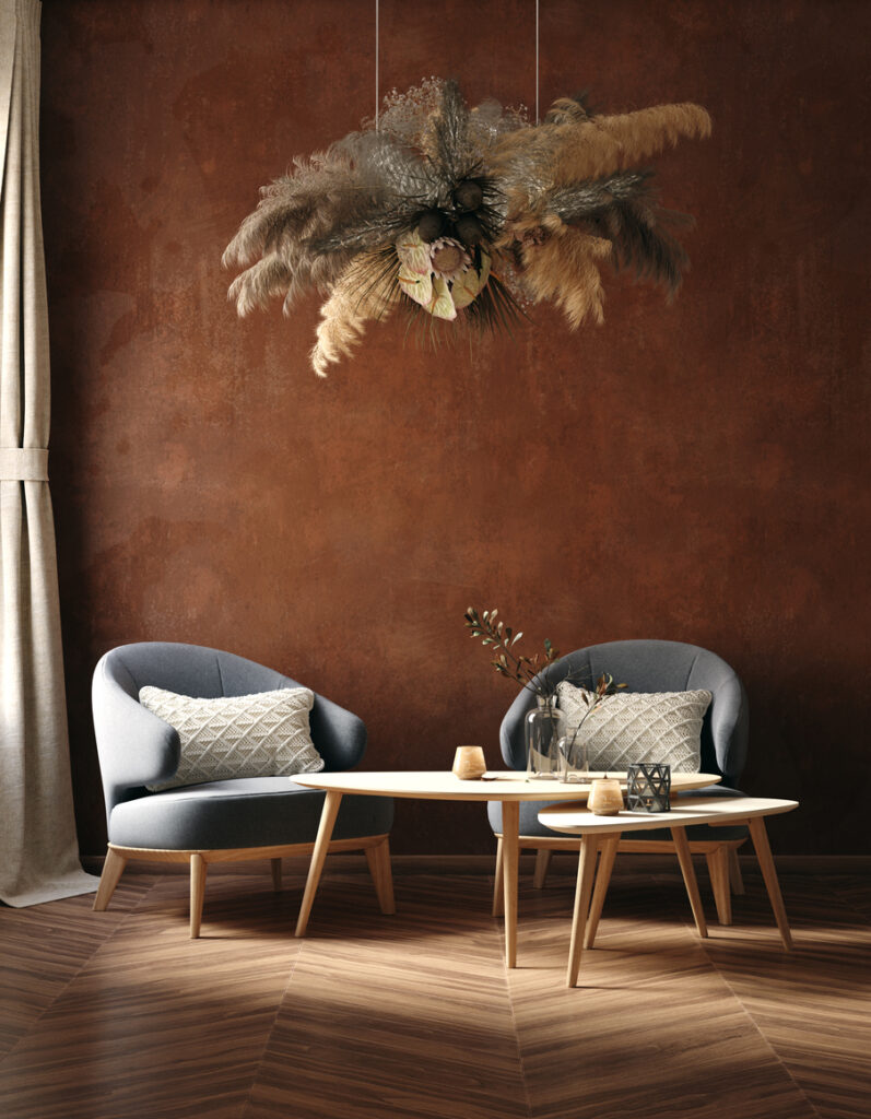 brown sitting area with hanging feathers