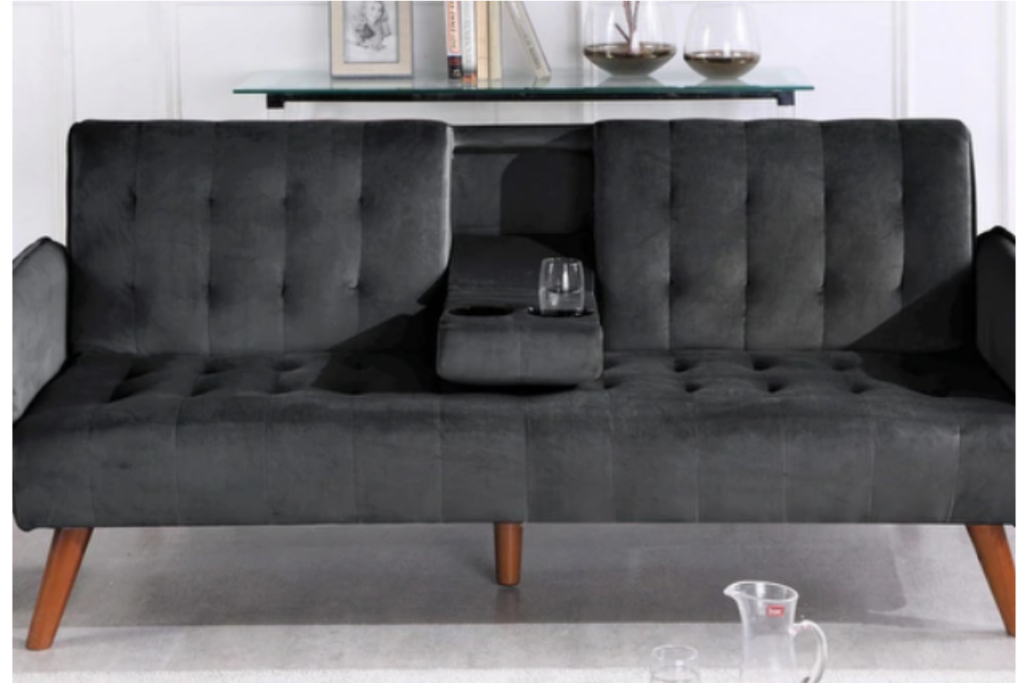 black sofa with cupholder divider