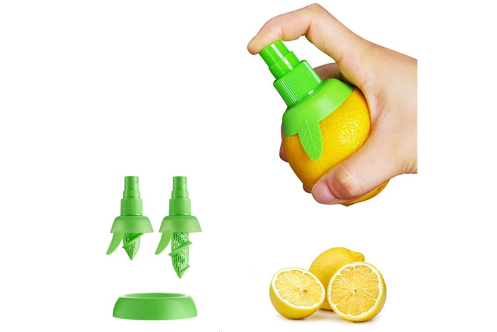 a person spraying from the citrus juicer on a lemon