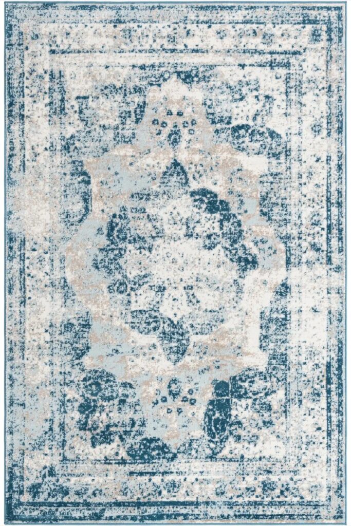 a styled vintage blue and white patterned rug