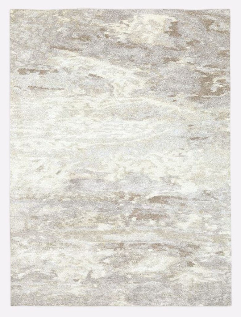 a beige west elm textured rug