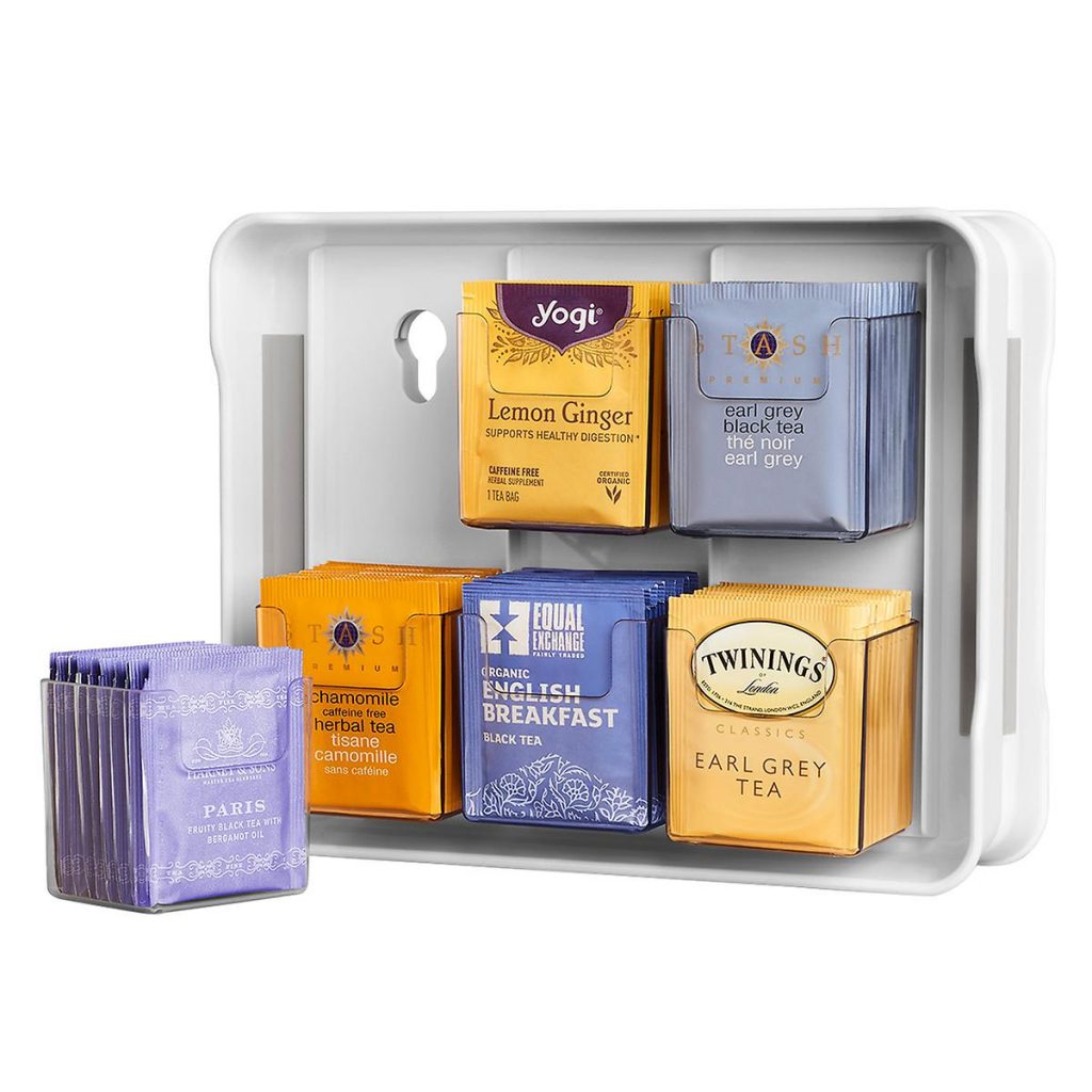 a tea organizer with yellow and purple tea bags