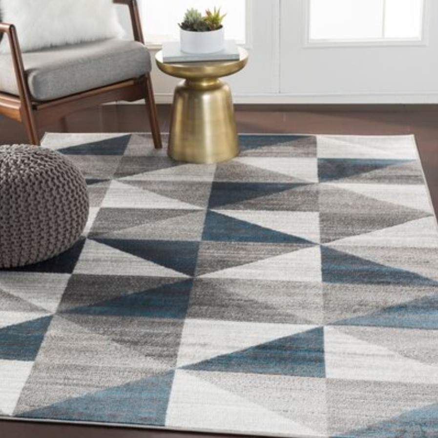 blue, grey, and white geometric rug