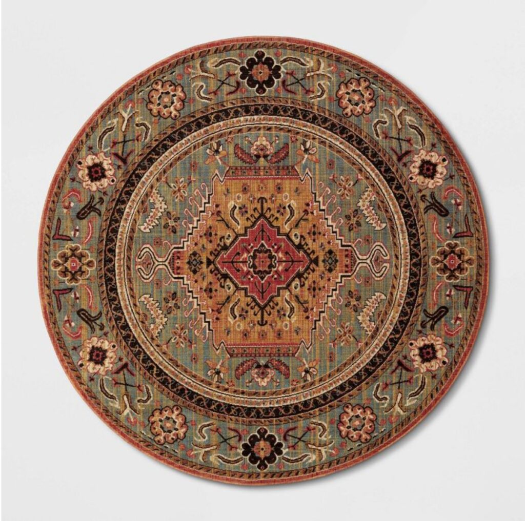 brown and red floral accent circle rug