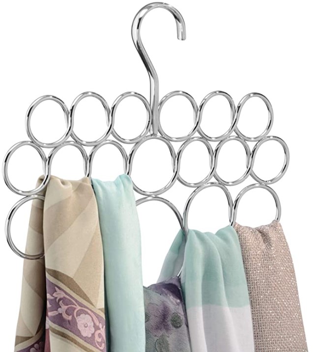 a hanging metal scarf organizer