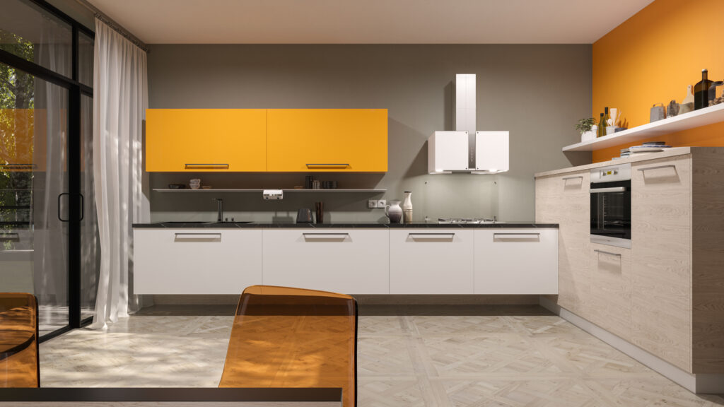 bright orange cabinets in a grey kitchen
