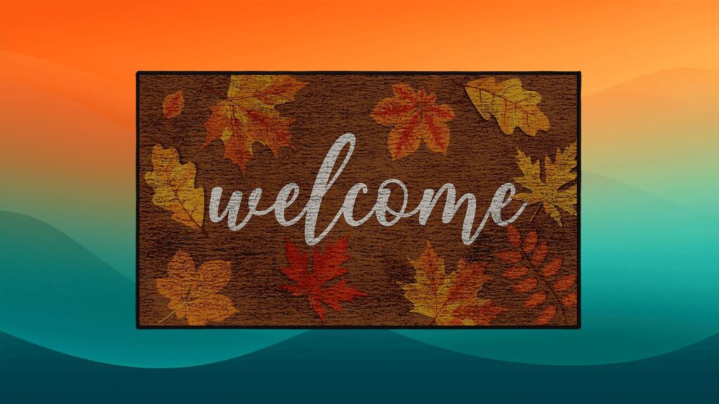 fall welcome mat that says "welcome" with orange, yellow, and red leaves in front of an orange and teal background