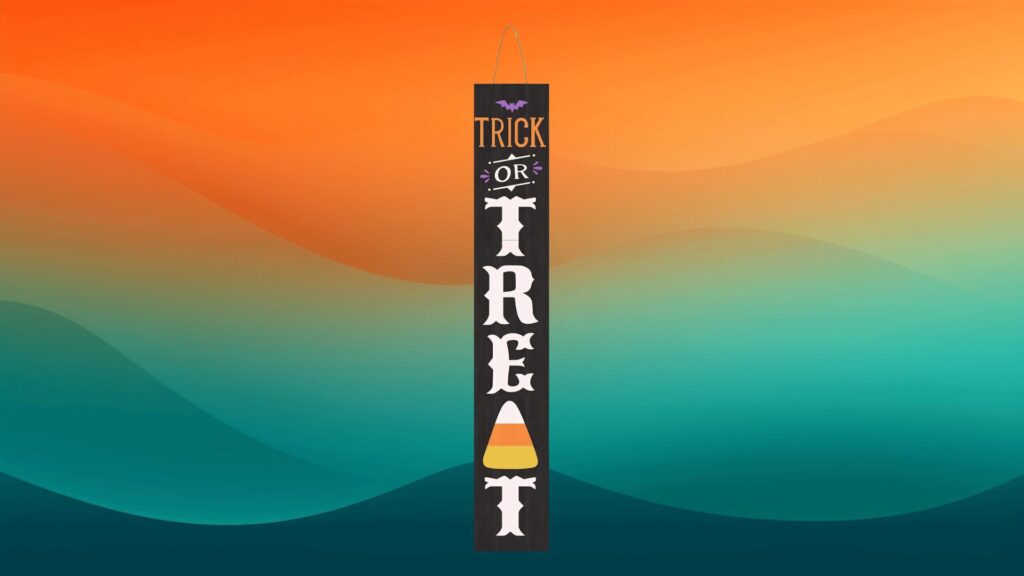 black trick or treat sign to decorate your porch for fall in front of an orange and teal background