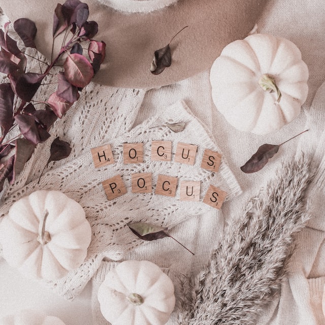 diy fall decor with hocus pocus spelled out in scrabble tiles