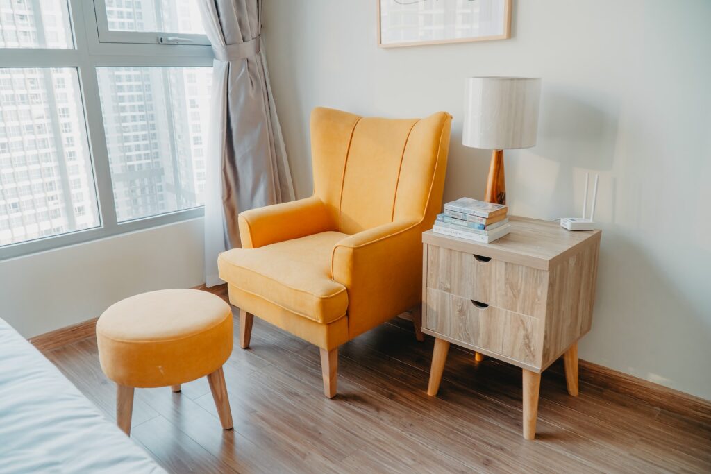 orange furniture with legs in a bright room