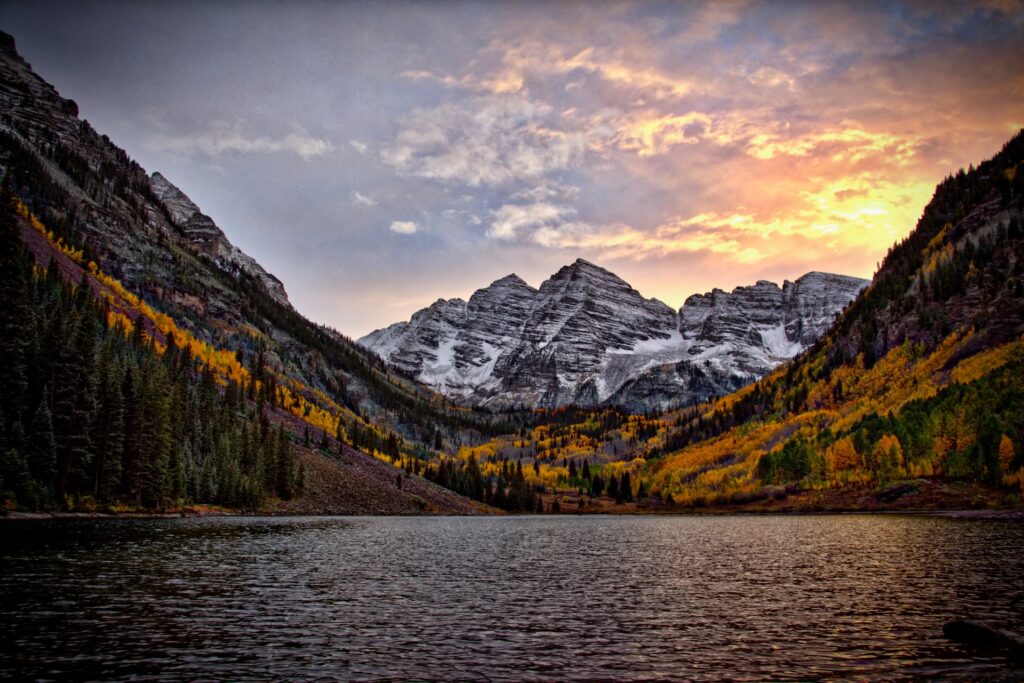 colorado mountains with lake at sunset