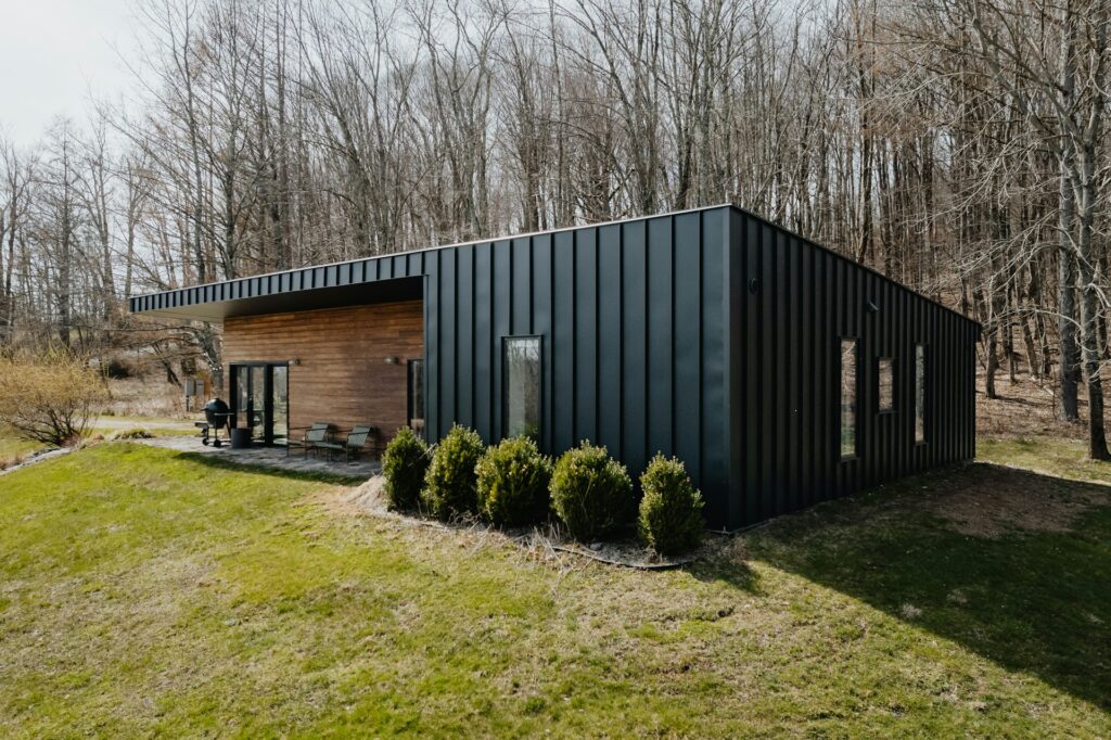 black and wooden converted shed house