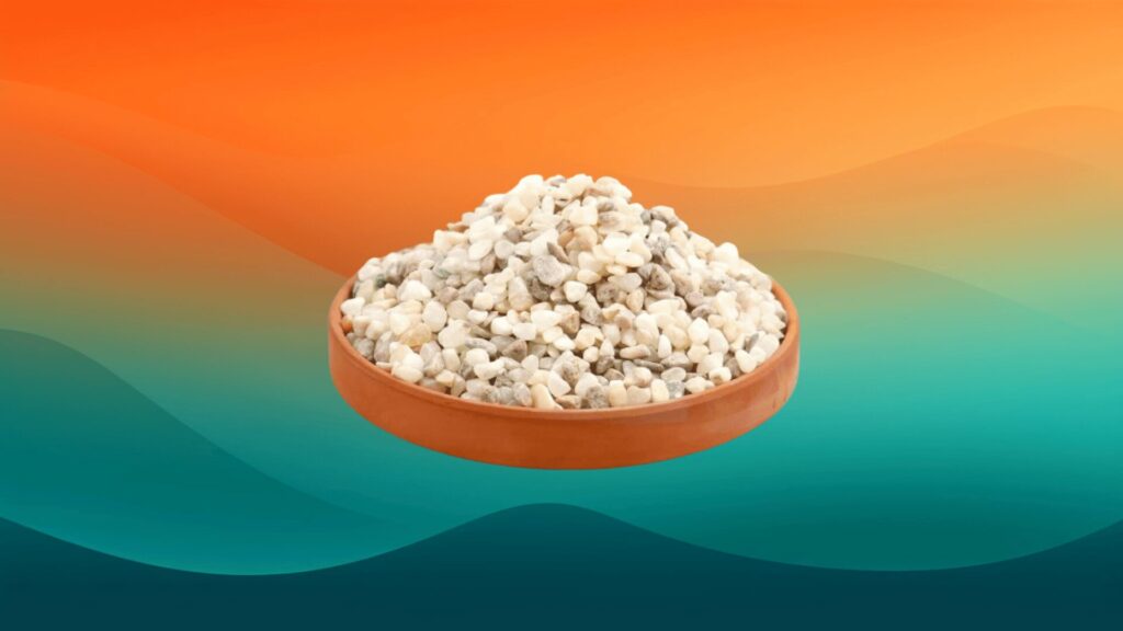 white and tan stones for potted plants in front of an orange and teal background