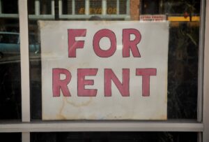 For rent sign in window.