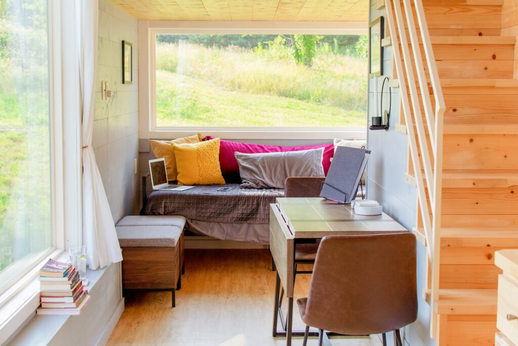 what is the tiny house movement - a living room and work desk in a tiny home