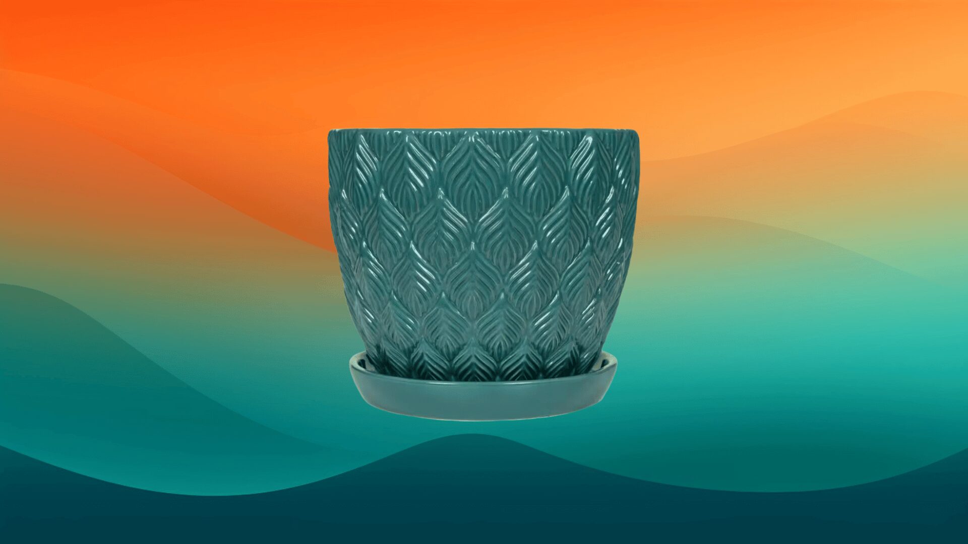 teal textured decorative flower pot in front of an orange and teal background