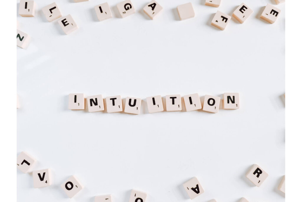 Scrabble tiles forming the word intuition.