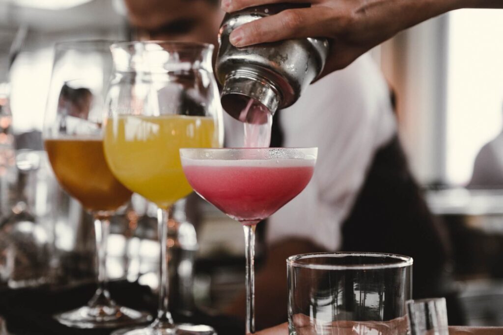 Bartender pouring cocktail drinks