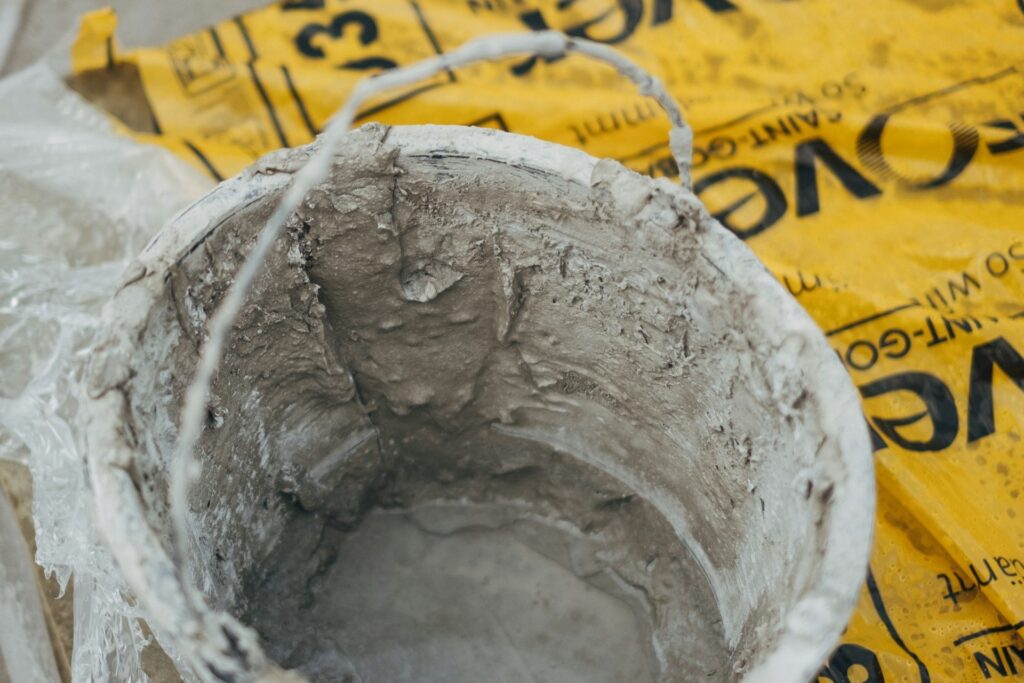 A bucket of wet concrete.