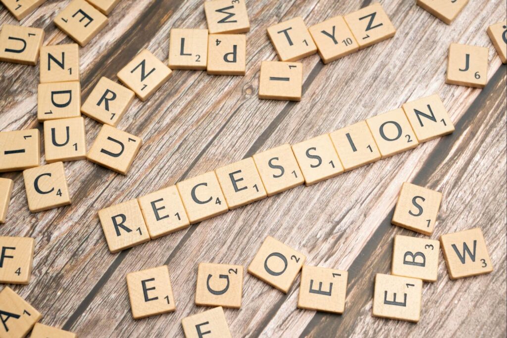 Scrabble tiles spelling the word recession