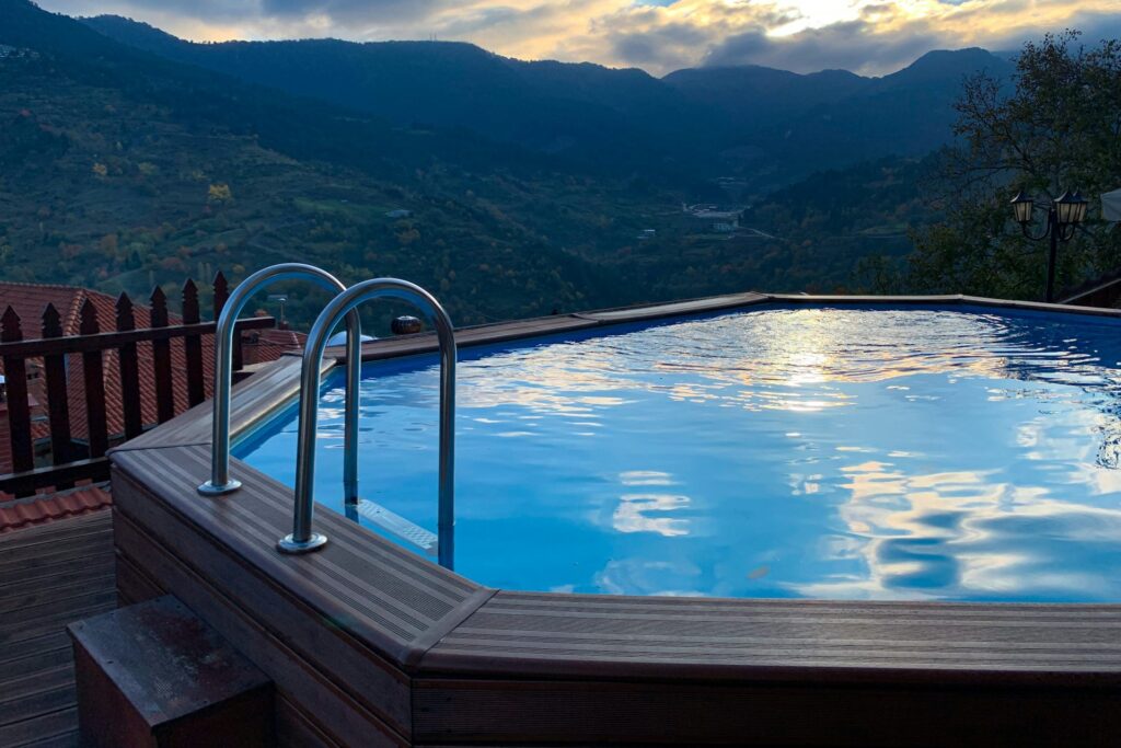 Above-ground pool overlooking a scenic valley