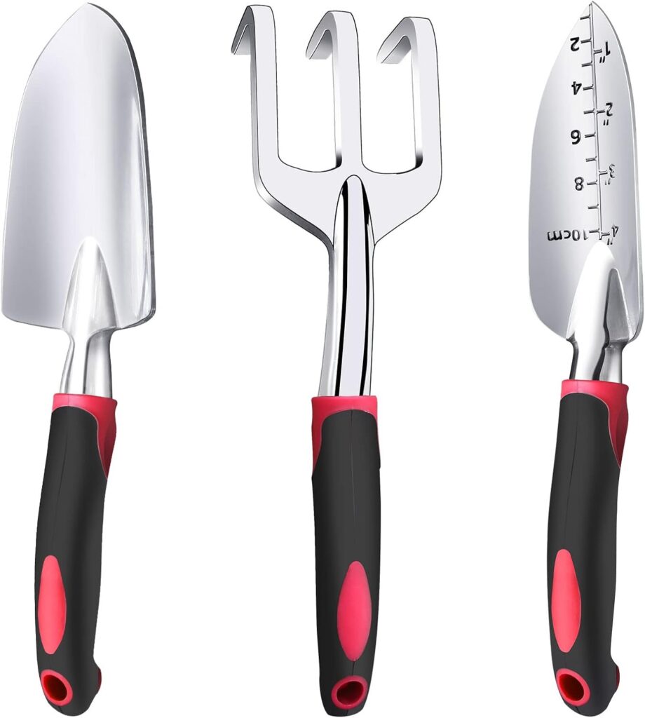 A trowel set containing a sharp trowel, a rounded trowel and a forked gardening tool sit against a white background.